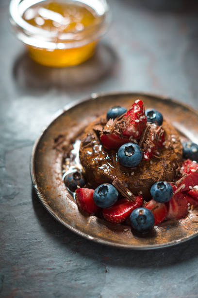 istock Vegan raw cake with bilberries and strawberries 821369660