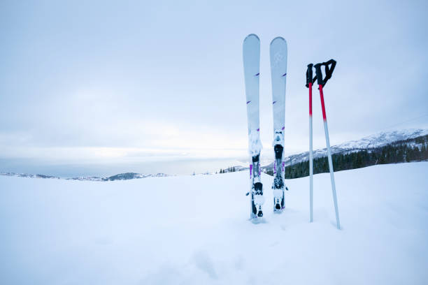 istock Skis on top of slope 821372390