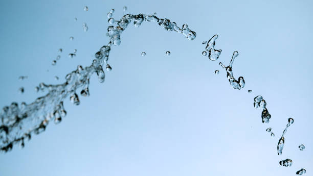istock Water droplet in blue background 821379770