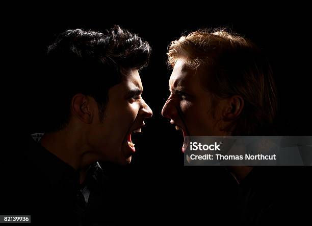 Teen Boy And Adult Male Yelling Stock Photo - Download Image Now - Arguing, Shouting, Anger