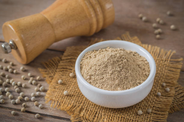 istock Ground white pepper in bowl and pepper shaker 821401716