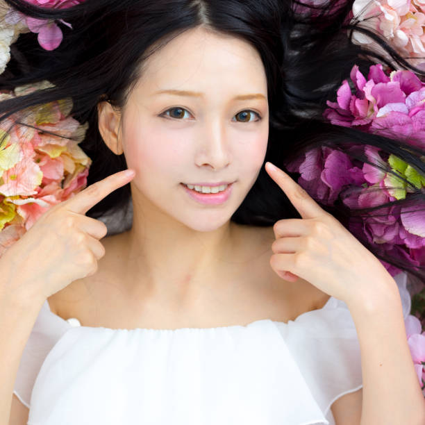 istock girl in flowers sleeping spa 821403836