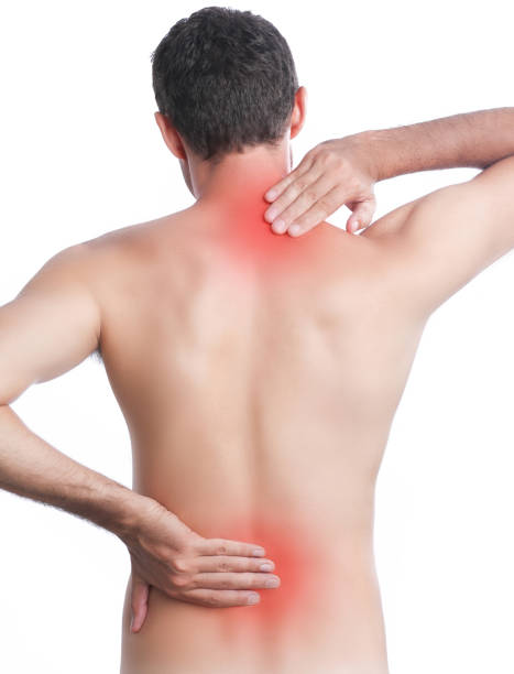 istock Young man with pain in neck and back 821406824