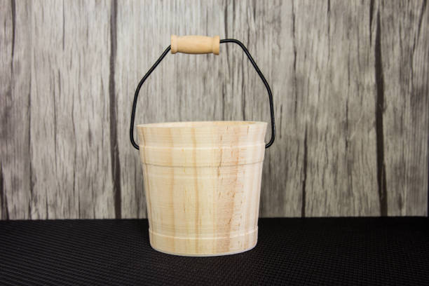 Wooden bucket on table