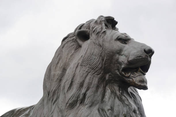 istock Lion statue guarding Nelson's Column in London 821426738