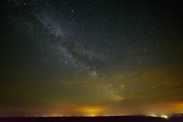 istock Galaxy Milky Way with clouds in the night sky 821433402