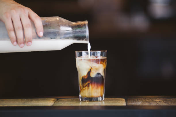 istock Pouring cream in cold brew coffee 821441862
