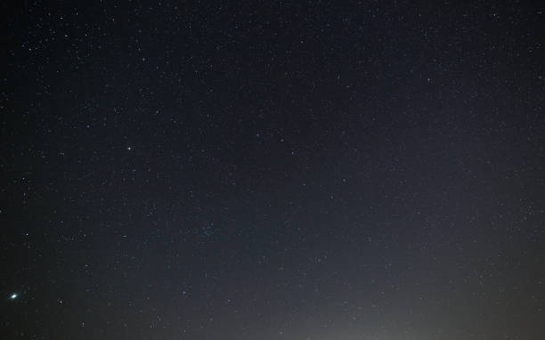 istock Night sky with bright stars. Astrophotography of outer space. 821445074