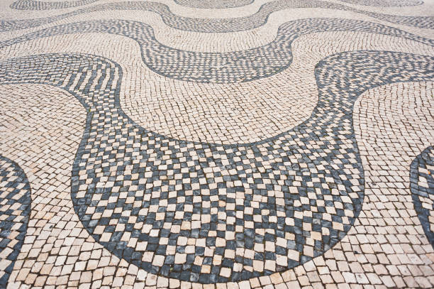 istock Traditional Portuguese pavement cobblestone - Lisbon 821453960