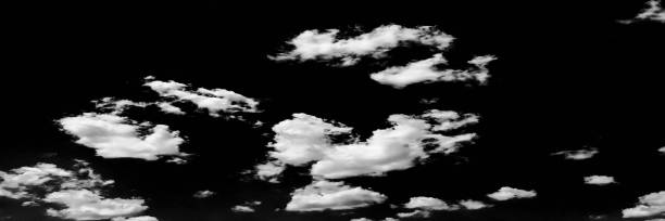 istock Isolated white clouds on black sky. Set of isolated clouds over black background. Design elements. White isolated clouds. Cutout extracted clouds. Clouds.Black Background. 821453982