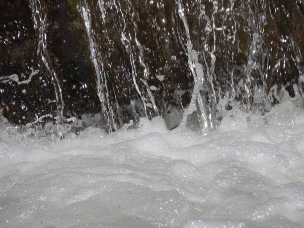istock Drain Canal Waterfall Closeup with Water Foam 821454396