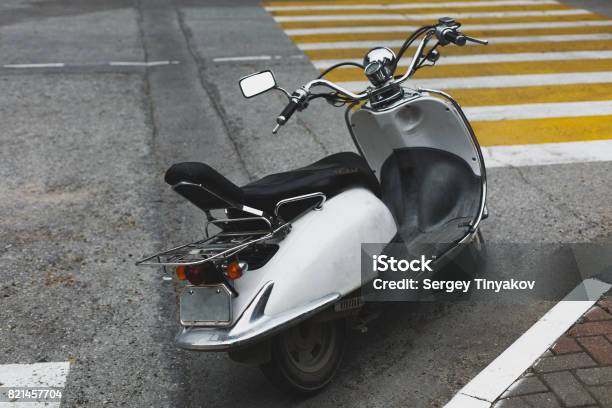 Retro Motoscooter Parked In The City Stock Photo Download Now - Culture and Backgrounds, City - iStock