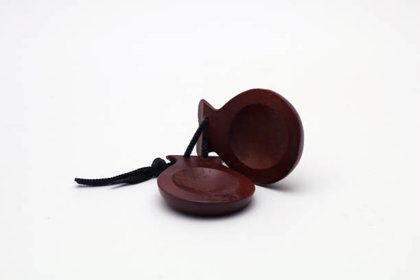 Spanish wooden castanets on a white background Spanish wooden castanets on a white background castanets stock pictures, royalty-free photos & images