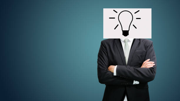 istock Businessman standing white paper face holding front 821460296