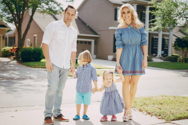 istock young family on the street 821463312