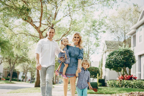 istock young family on the street 821463382