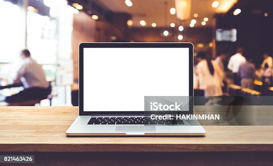 istock Computer,laptop with blank screen on table cafe,restaurant 821463426