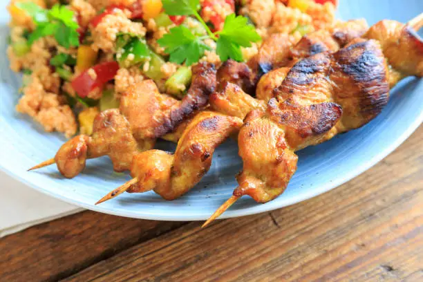 cous cous salad with chicken skewers