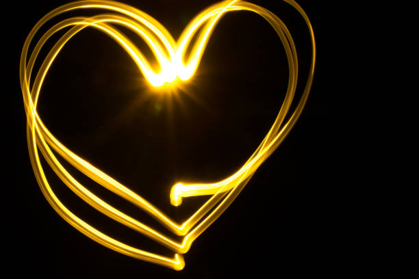 istock Image of the heart with a light source on the camera's matrix on a dark background 821463920
