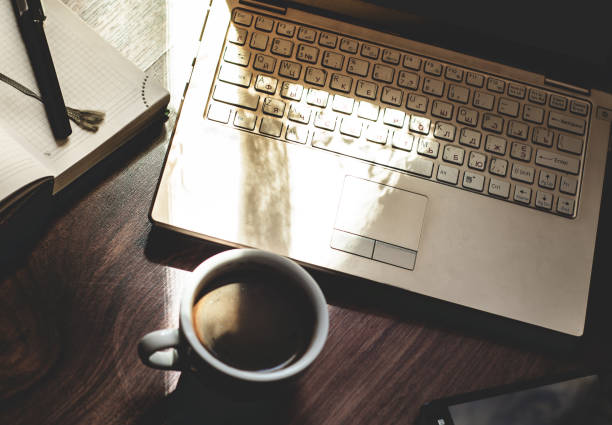 istock Laptop, cup of coffee and notepad 821464656