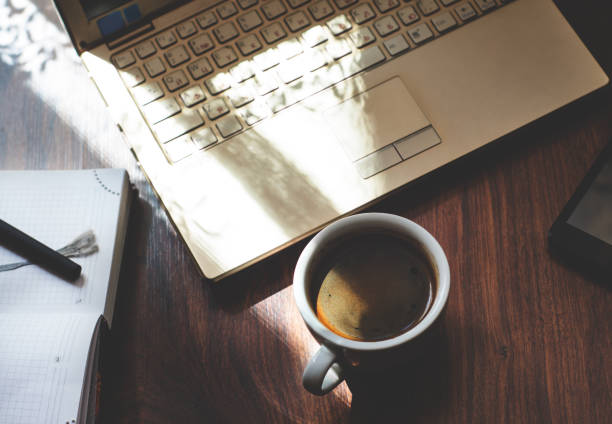 istock Laptop, cup of coffee and notepad 821464658