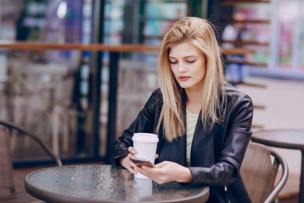 istock beautiful blonde in  caf 821467144