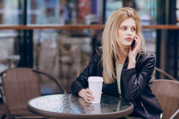 istock beautiful blonde in  caf 821467192