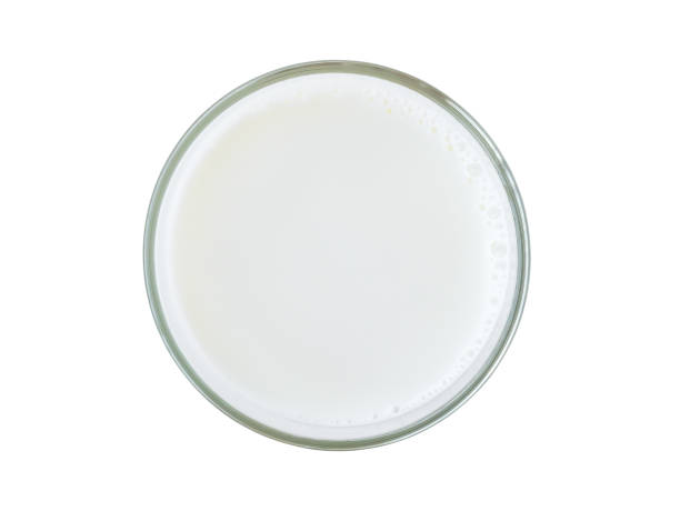 istock Top view of milk glass isolated on white 821467394