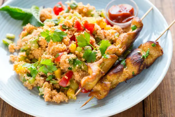 cous cous salad with chicken skewers