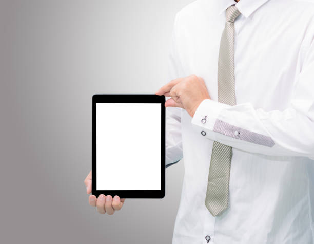istock Businessman standing posture hand holding blank tablet 821472390