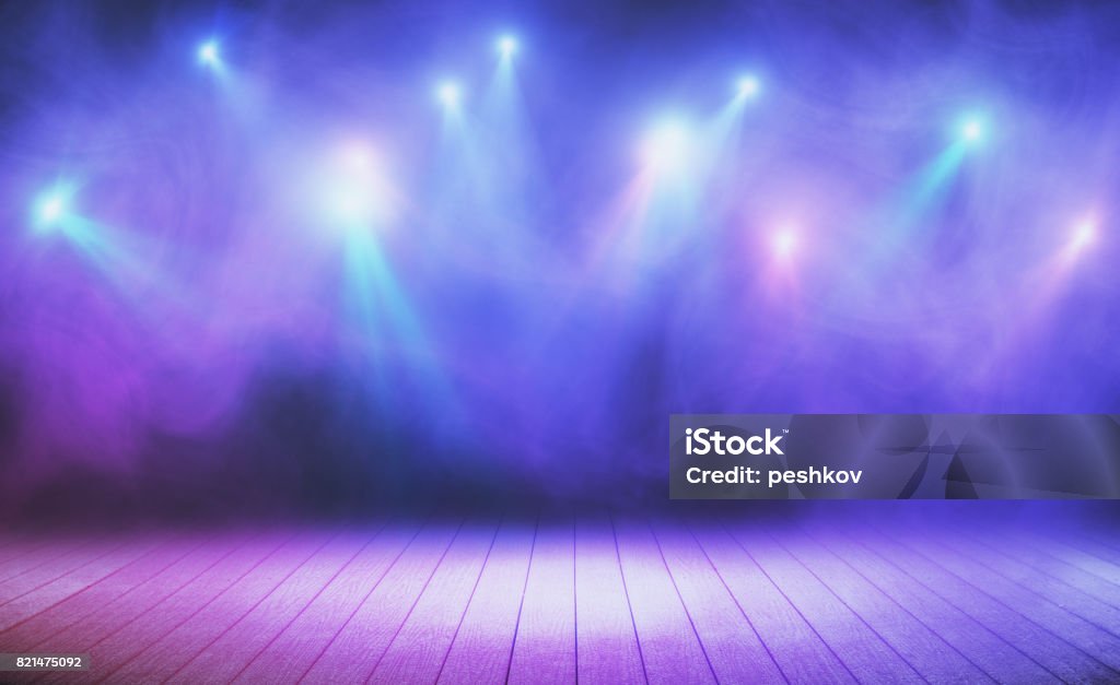 Presentation concept Wooden stage with blue smoke and spot lights. Presentation concept Stage - Performance Space Stock Photo