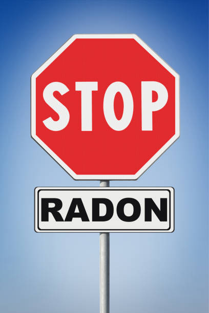 istock Stop radon - Concept image with road sign on blue background 821478838