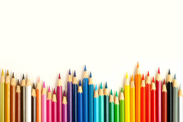 Coloring pencils on row Complete set of coloring pencils with white background colored pencil stock pictures, royalty-free photos & images