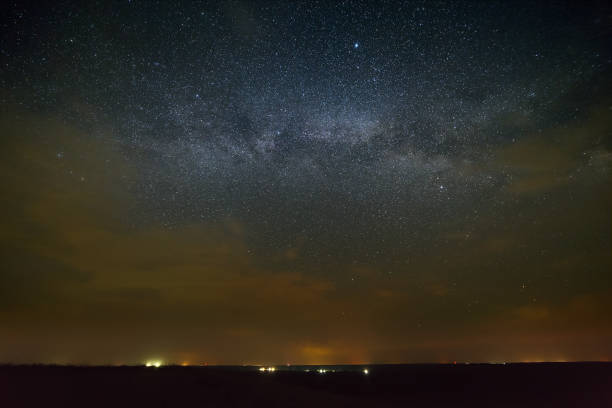 istock Galaxy Milky Way with clouds in the night sky 821482742