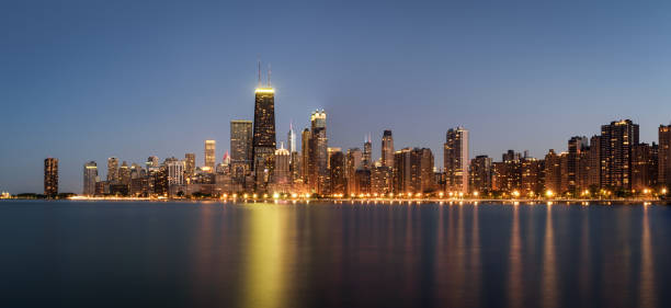 istock Chicago skyline panorama at night viewed from North Avenue Beach 821485212