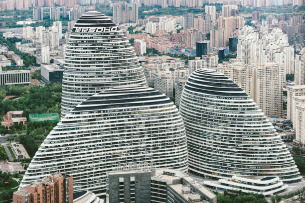 Wangjing SOHO (望京SOHO) is a complex of three curvilinear asymmetric skyscrapers in Wangjing, a suburb of Beijing, China between central Beijing and Beijing Capital International Airport.