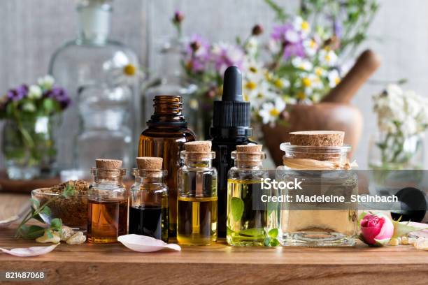 Selection Of Essential Oils Stock Photo - Download Image Now - Herbal Medicine, Essential Oil, Herb