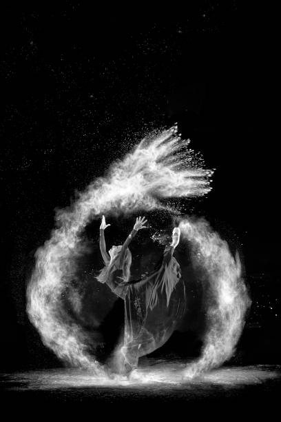 istock Beautiful ballet dancer, dancing with powder on stage 821494668