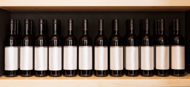 istock Old wine bottles on the wine shelf 821502198