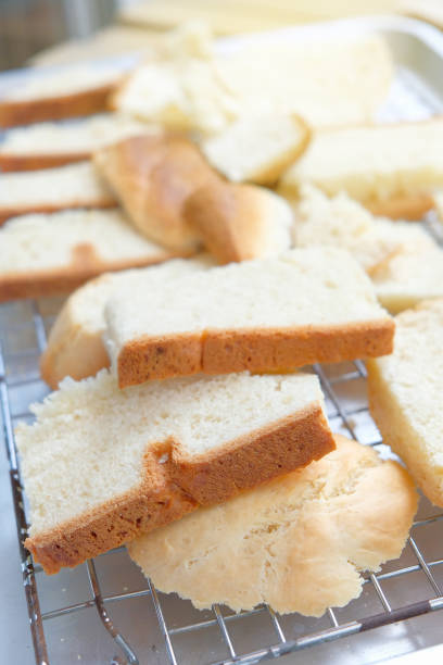 istock Sliced plain breads was baked from oven are over stainless grill 821502572