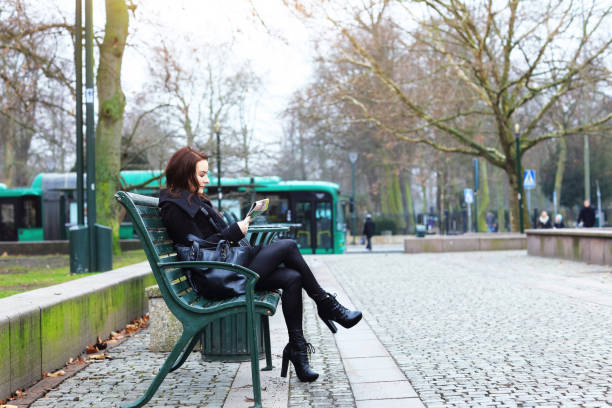 istock Businesswoman reading newspaper 821508816