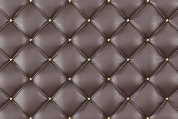 Brown Leather Upholstery Sofa Background. Brown Luxury Decoration Sofa. Elegant Brown Leather Texture With Buttons For Pattern and Background. 3D Rendering Brown Leather Upholstery Sofa Background. Brown Luxury Decoration Sofa. Elegant Brown Leather Texture With Buttons For Pattern and Background. Leather Texture for Graphic Resource. 3D Rendering red cushion covers stock pictures, royalty-free photos & images