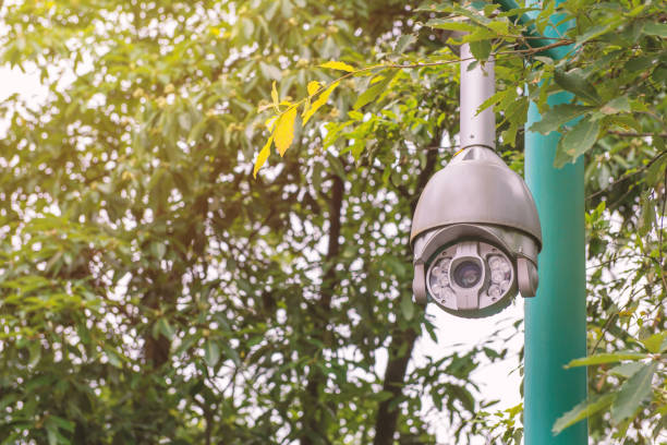 istock Security CCTV camera and urban video at public park 821512922