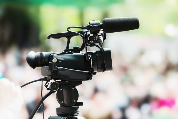 istock portable camera with a blurred background people 821516284