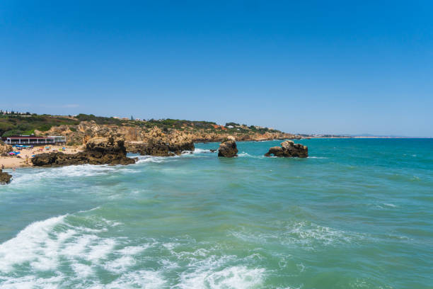 istock A view of a marvelous sandy beach portugal. Summer time 821517458