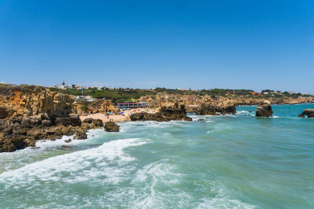 istock A view of a marvelous sandy beach portugal. Summer time 821517572
