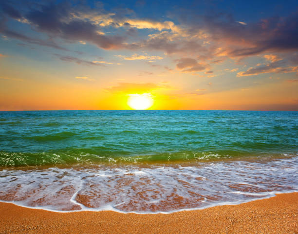 istock emerald sea sandy beach at the sunset 821521036