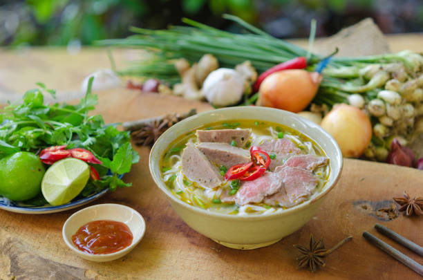 istock Vietnamese pho soup with beef, meatball, fresh vegetable 821521214