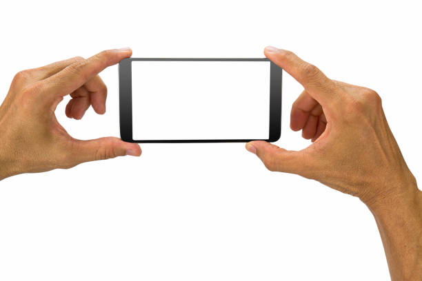 istock Man's hands holding white screen mobile phone isolated on white background 821521720