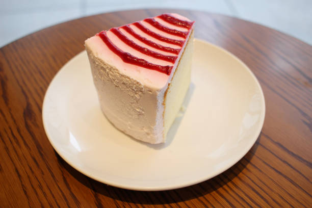 istock whipped cream cake on wooden table 821527924